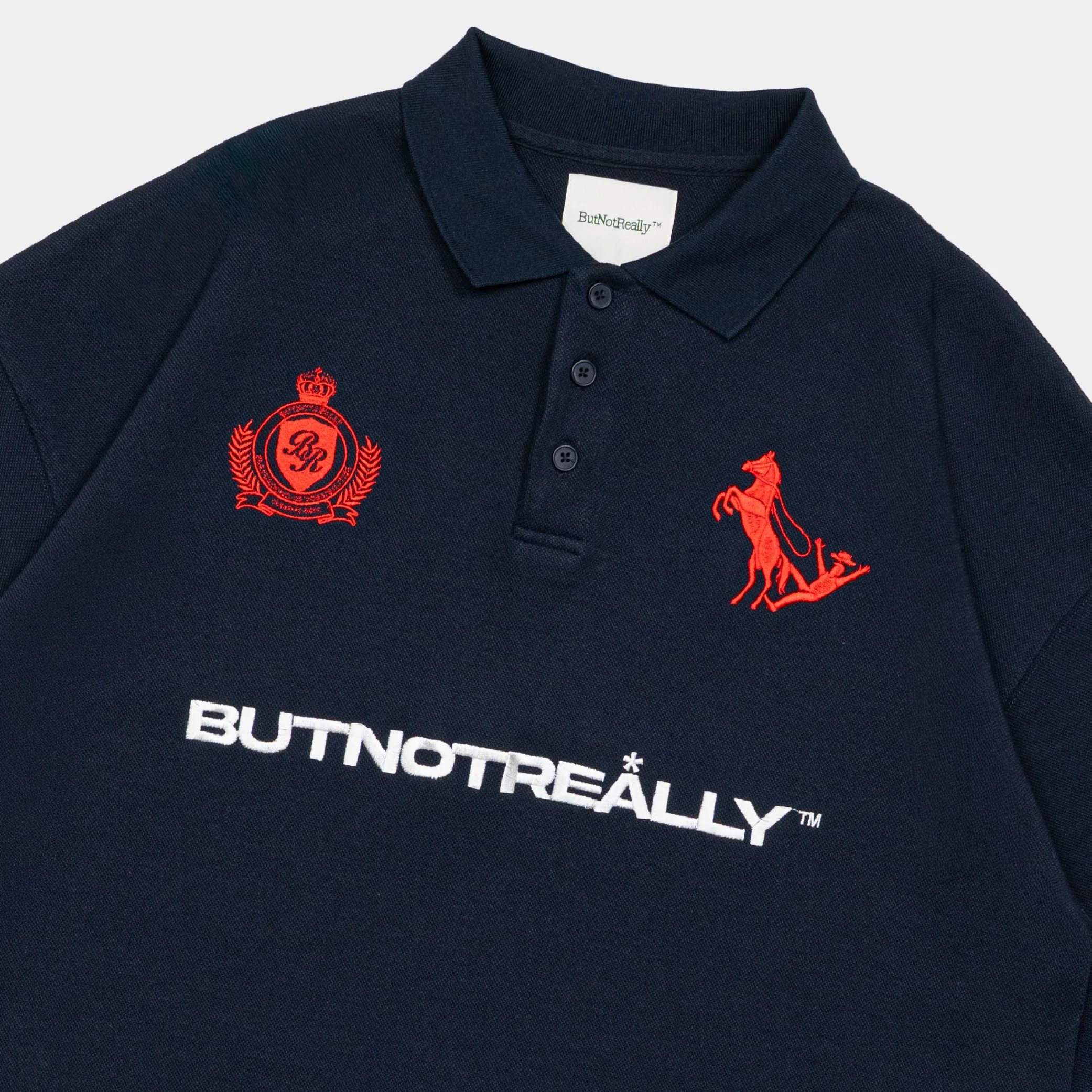 ButNotReally™ Graphic Interlock Oversized Polo Tee - Image 4