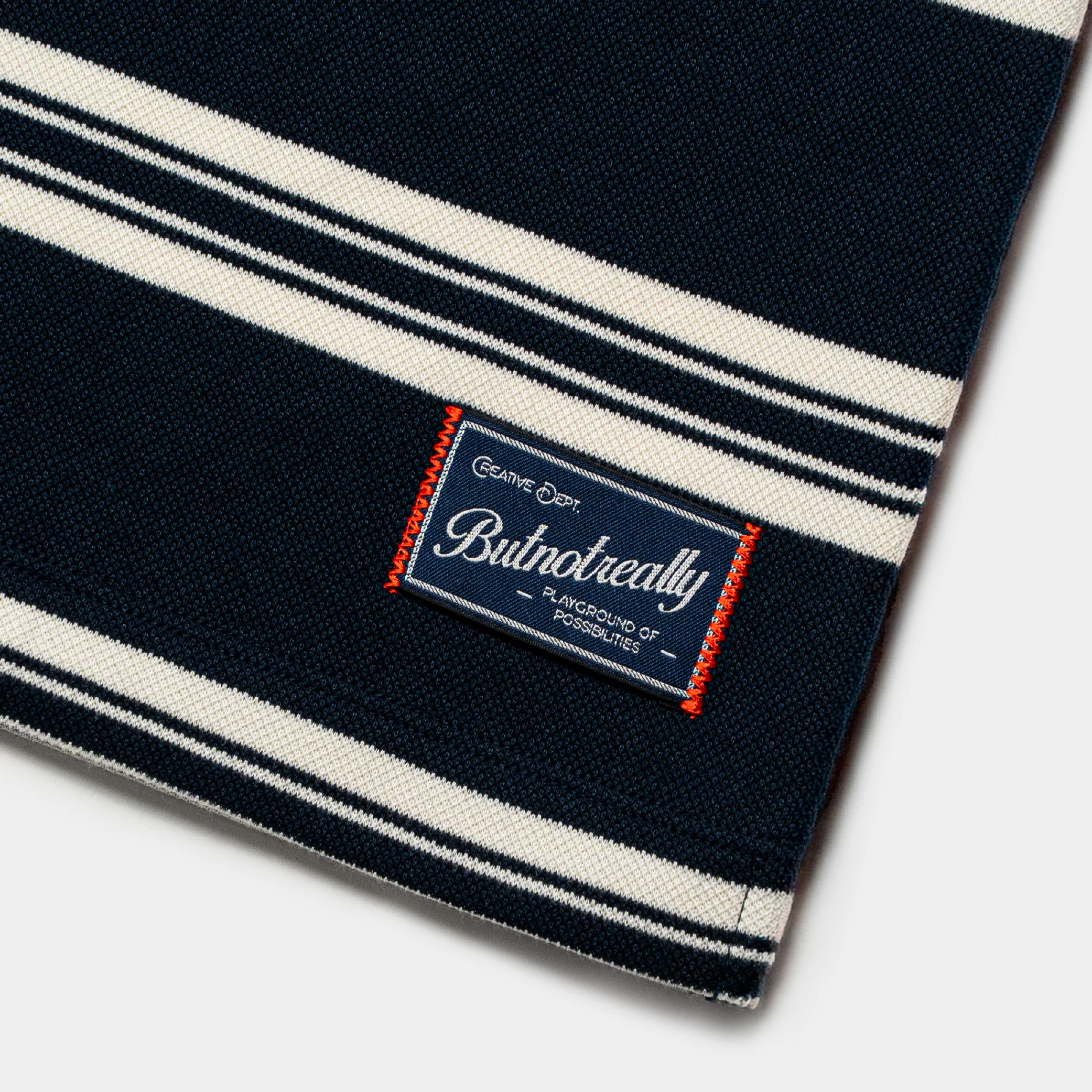 ButNotReally™ Interlock Stripes Polo Tee - Image 8