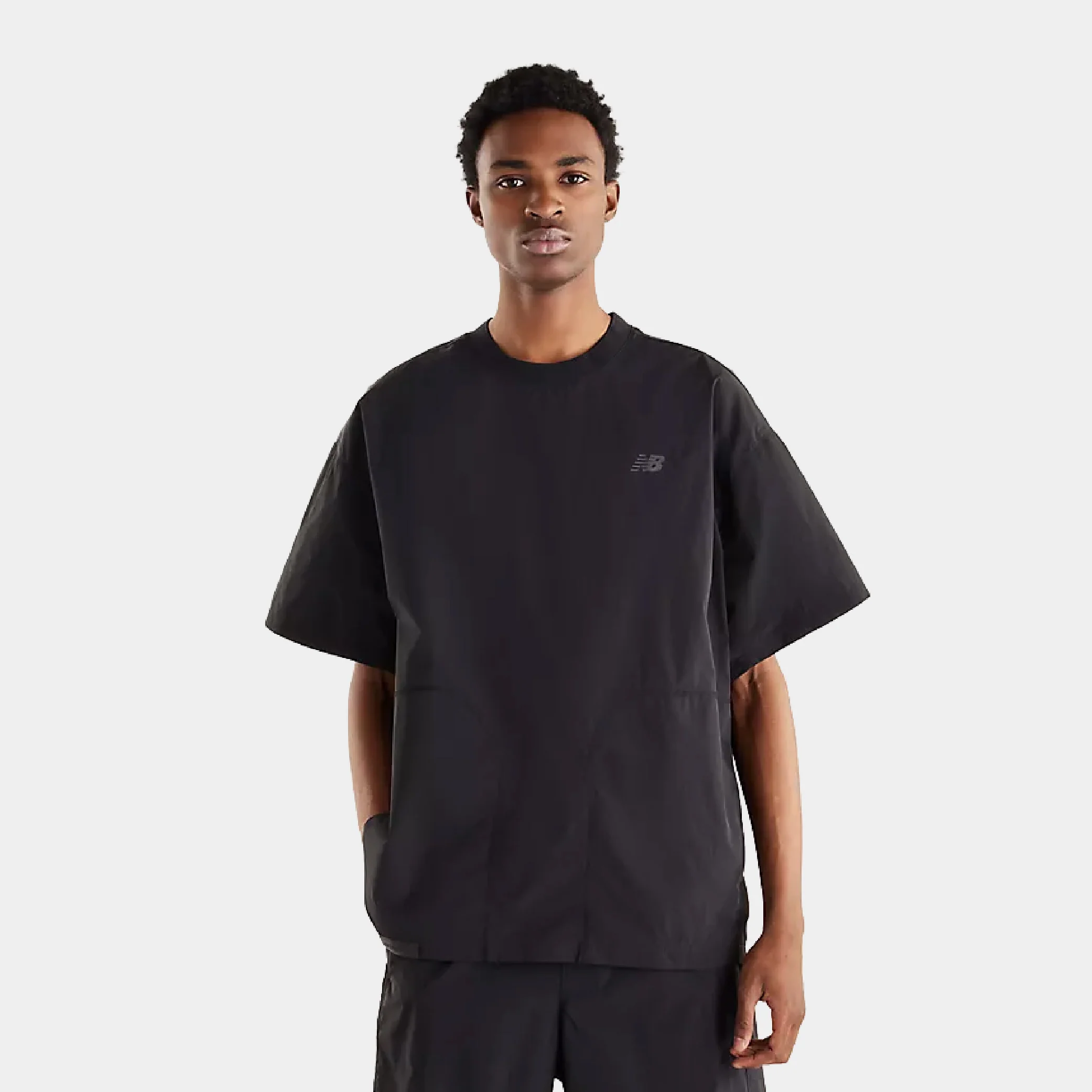 New Balance NBX Shifted 2 Woven Tee - Image 5